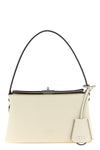 the prada midi handbag sets new standards for structured luxury