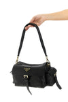 prada explore shoulder bag in hand-treated nappa leather for a worn effect