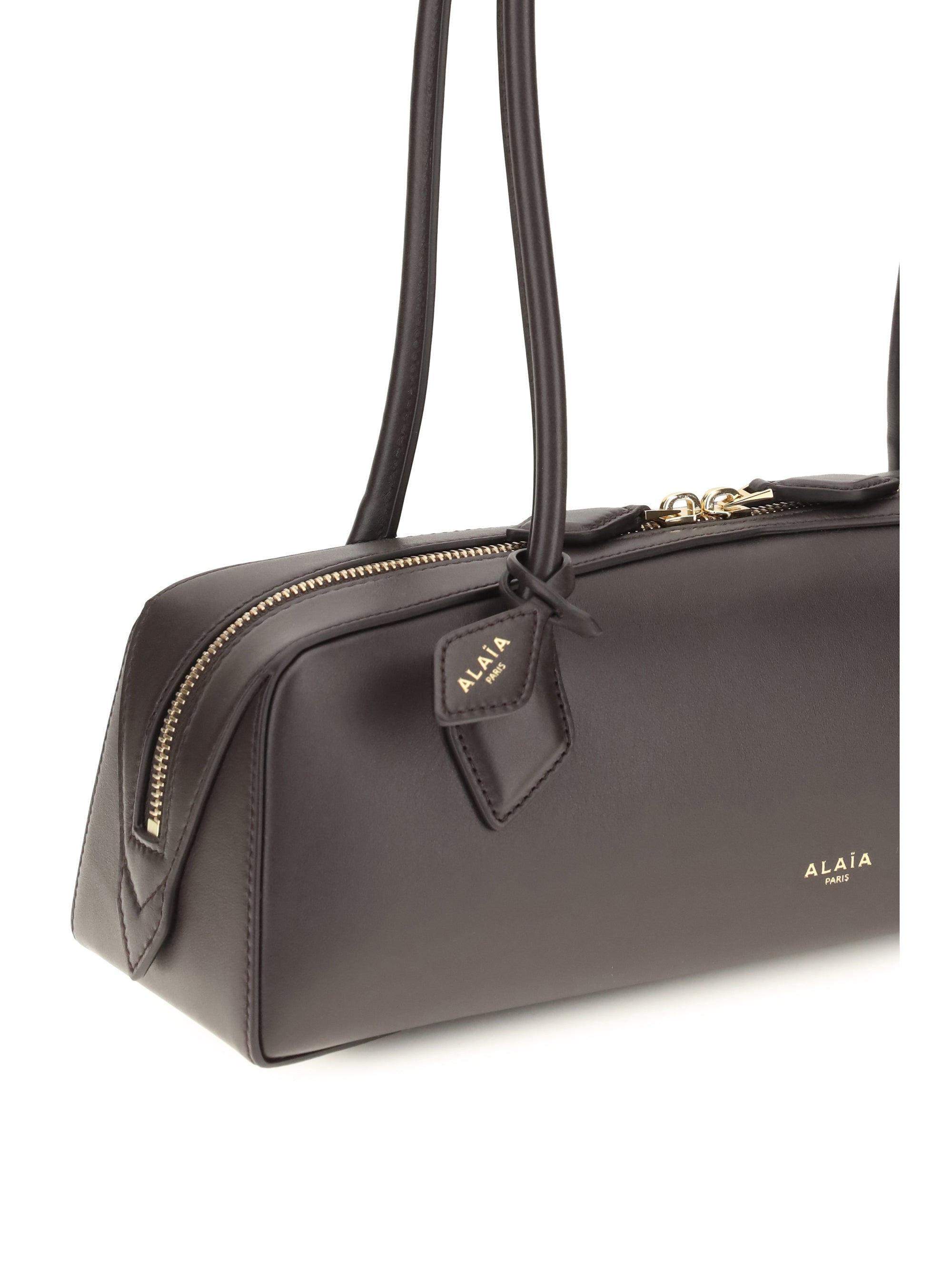small le teckel shoulder bag