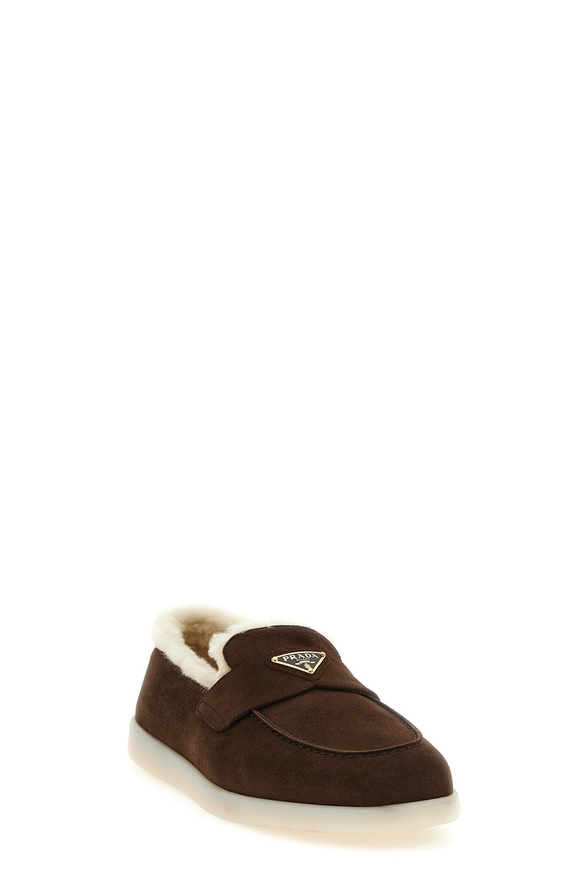 prada suede loafers redefine comfort through a luxurious and relaxed aesthetic