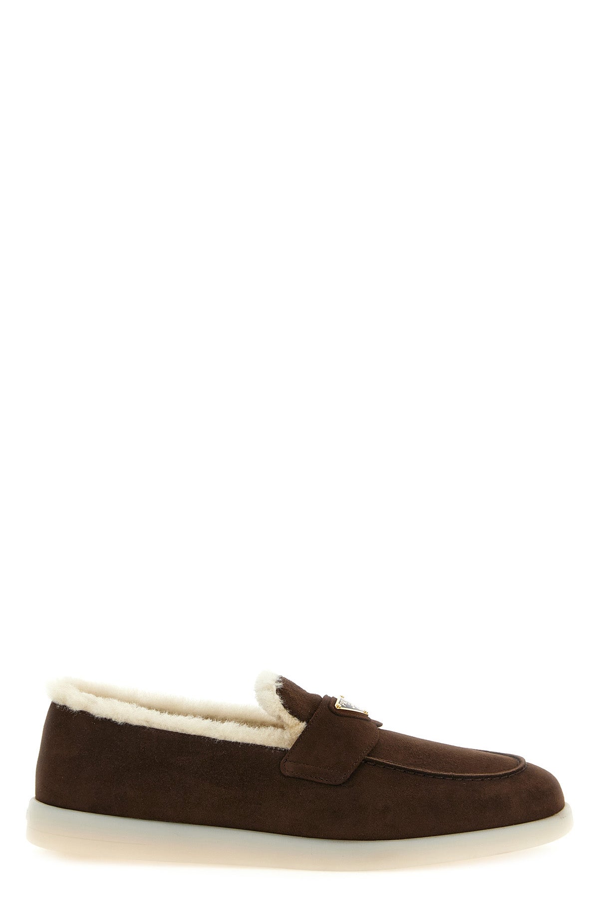prada suede loafers redefine comfort through a luxurious and relaxed aesthetic