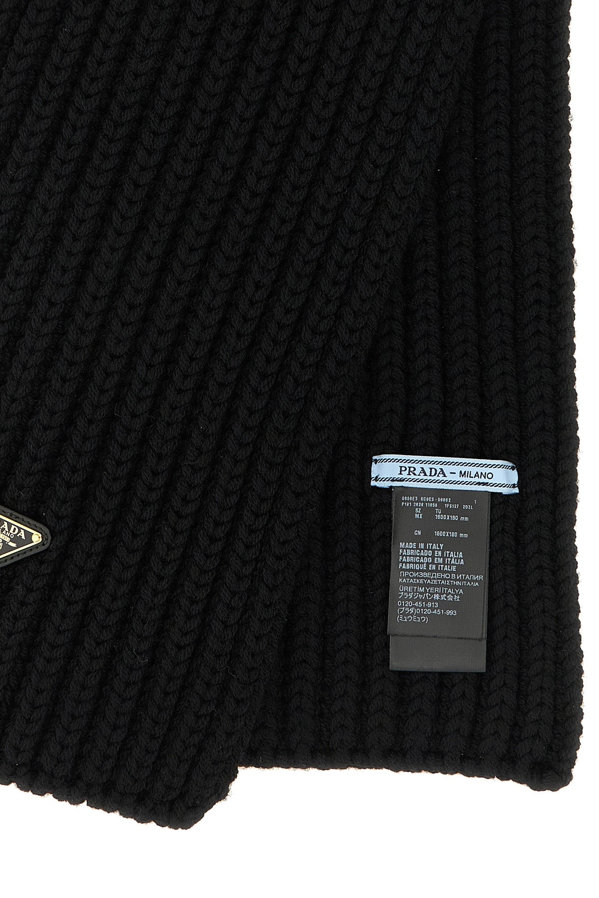 the prada virgin wool logo scarf defines winter aesthetics through rigorous engl