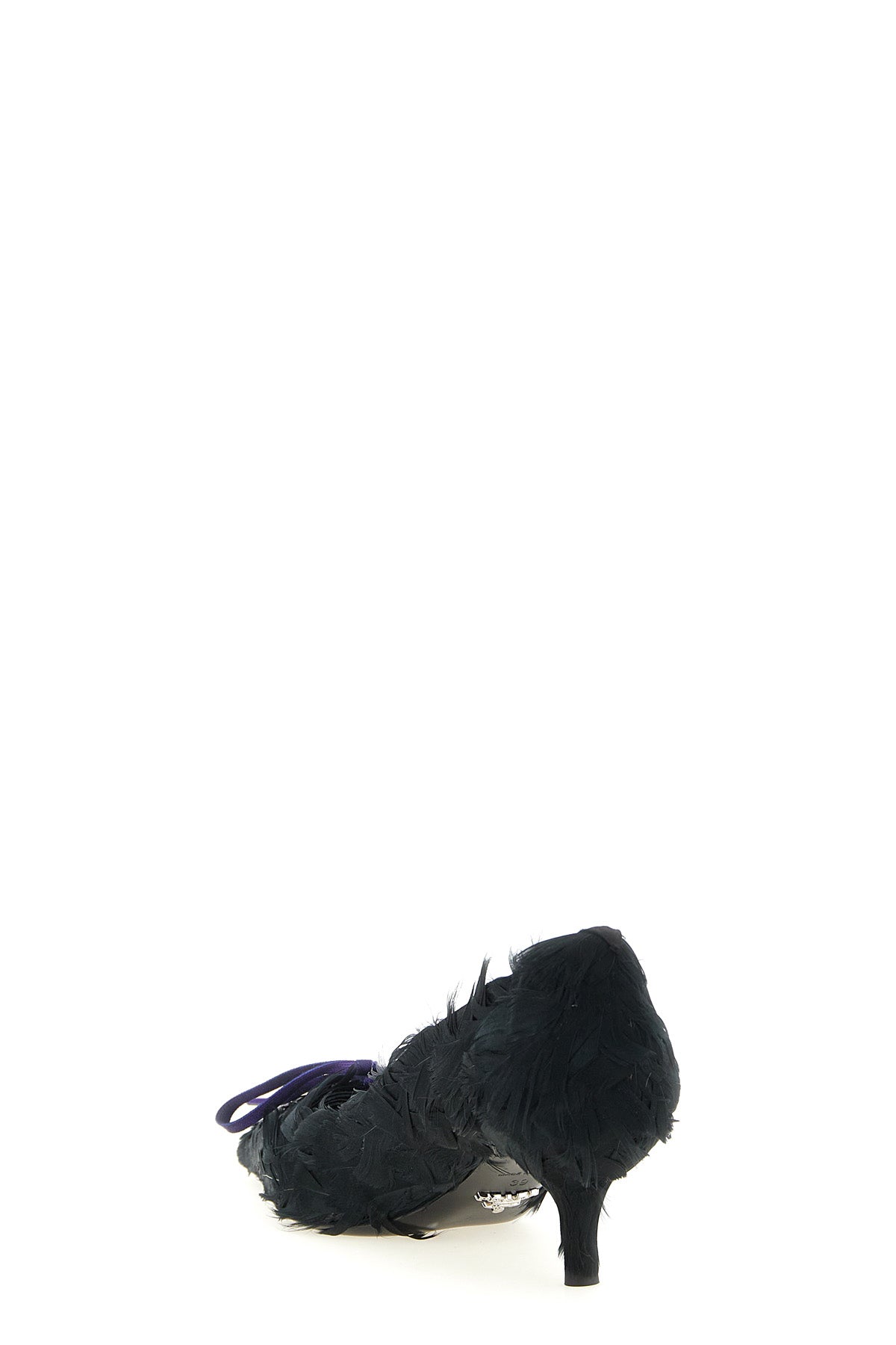 prada pumps redefine the classic form through a bold material exploration