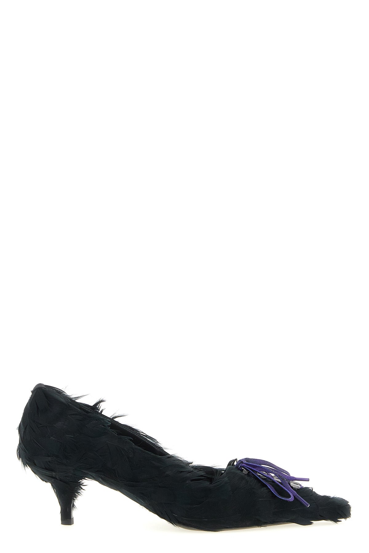 prada pumps redefine the classic form through a bold material exploration