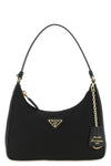 the prada re-edition 2005 mini shoulder bag reinterprets an archival design th