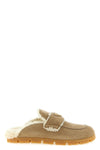 the prada sabot in soft calf suede redefines the concept of slip-on footwear thr