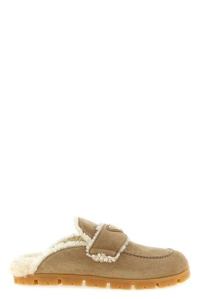 the prada sabot in soft calf suede redefines the concept of slip-on footwear thr