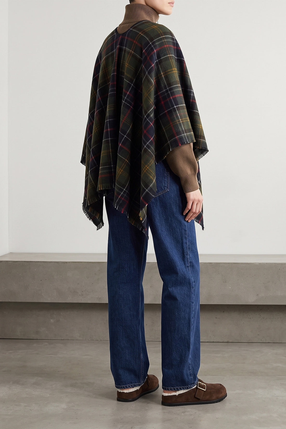 PRADA 36 the prada sabot redefines informal luxury through a meticulous slip-on silhouett
