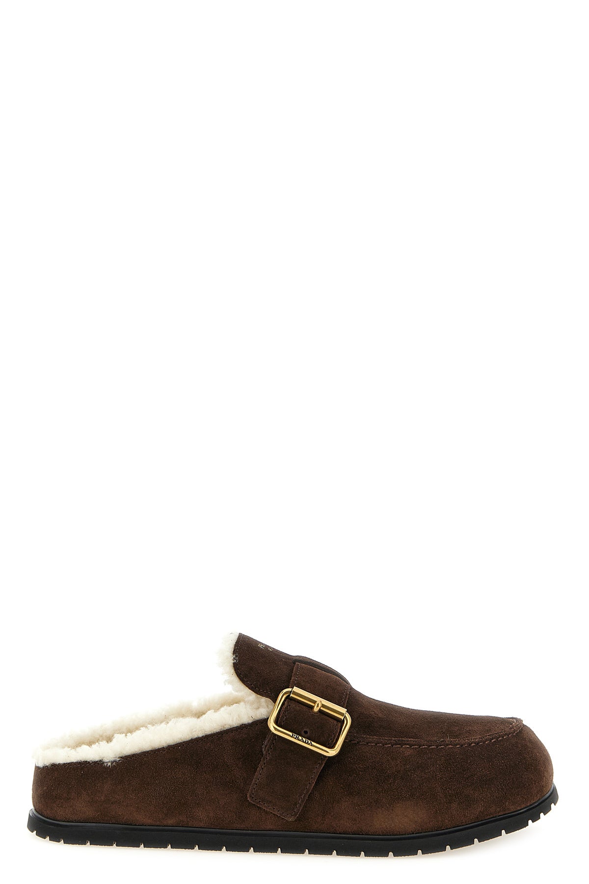 the prada sabot redefines informal luxury through a meticulous slip-on silhouett