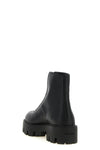 prada ankle boots redefine functional elegance through a bold and structured sil