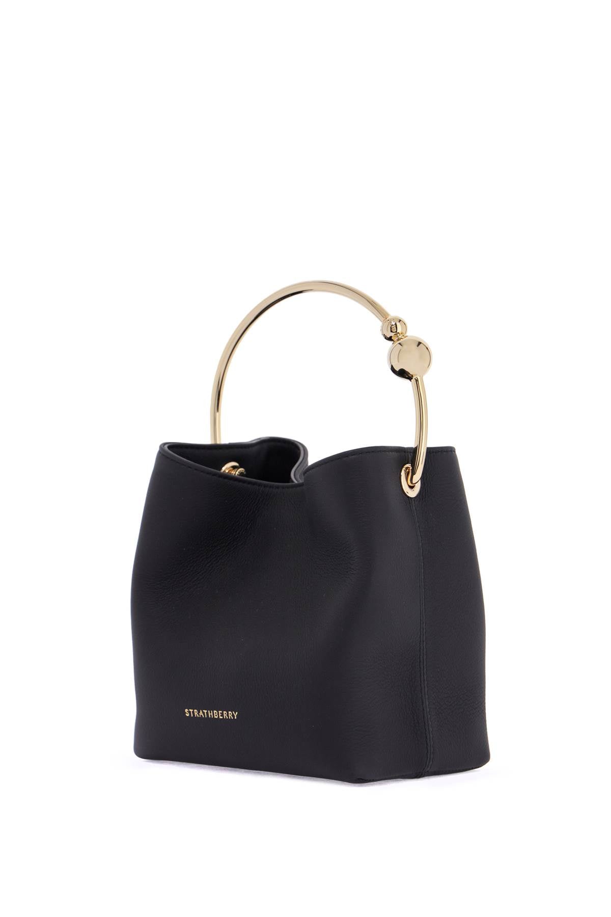 black calfskin bag with golden circular handle