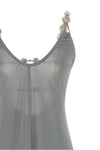the long eres sculpturale dress defines the silhouette through a fluid and ela