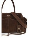 carry large suede handbag