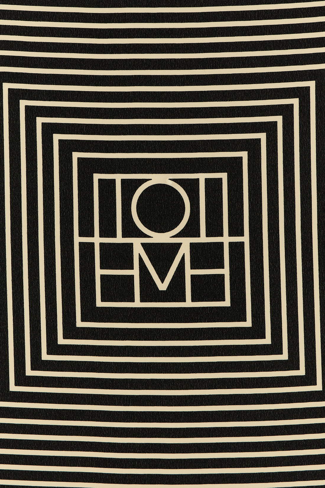 TOTEME OS the toteme centered monogram scarf redefines everyday elegance through versati