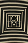 the toteme centered monogram scarf redefines everyday elegance through versati