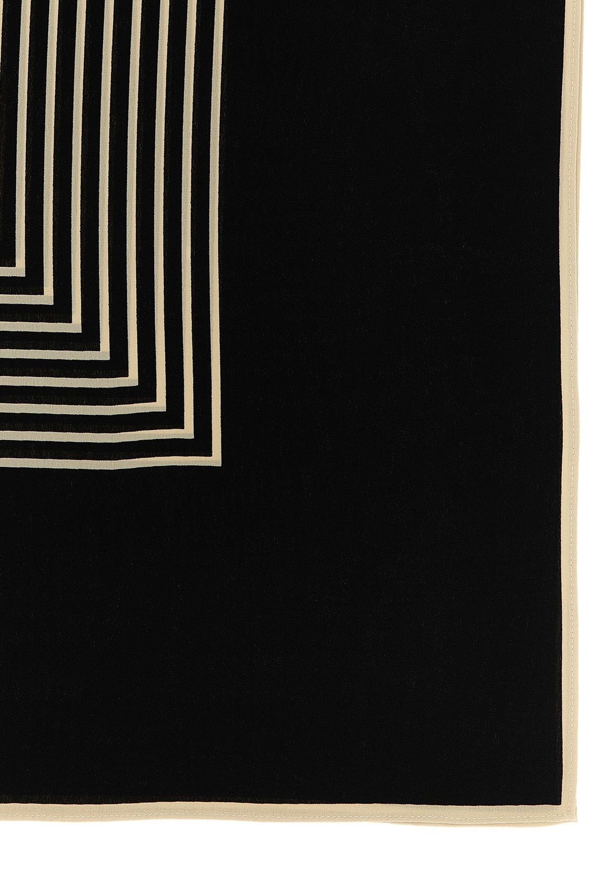 the toteme centered monogram scarf redefines everyday elegance through versati