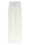 wrap pants in embroidered and perforated cotton lace