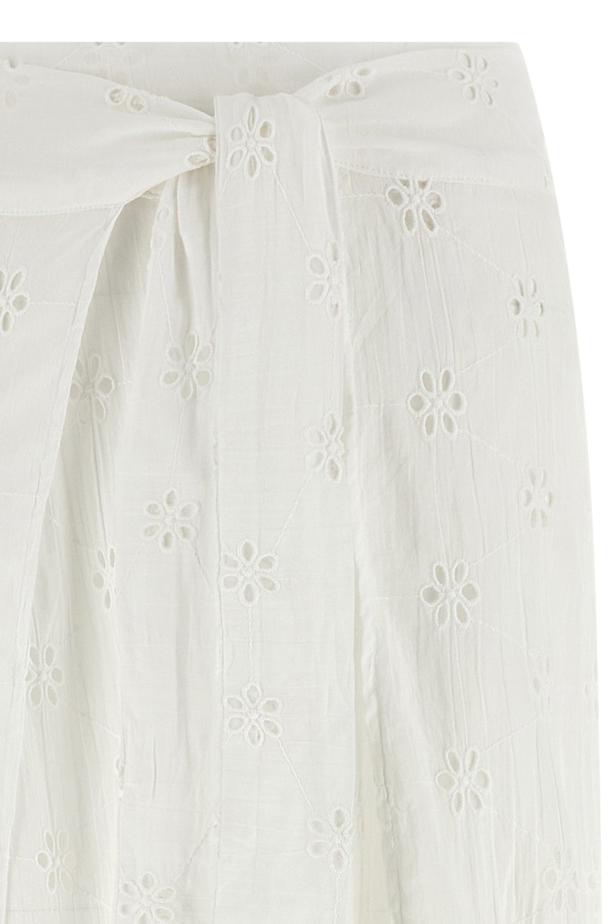 wrap pants in embroidered and perforated cotton lace