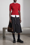 the prada midi skirt in black re-nylon is distinguished by a flared silhouette