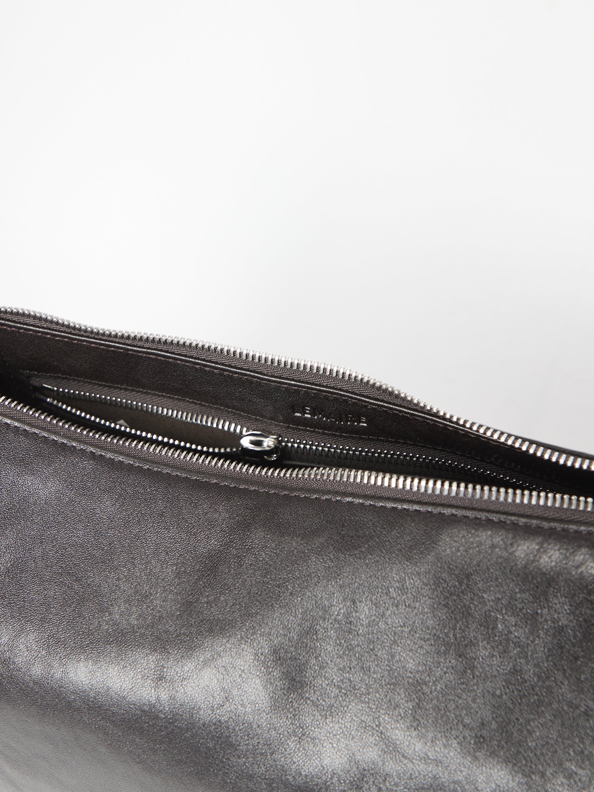 brown belted baguette bag