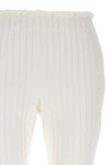 pleated cotton pants at the front and ribbed pants at the back