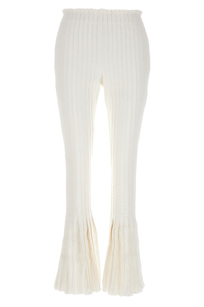 pleated cotton pants at the front and ribbed pants at the back
