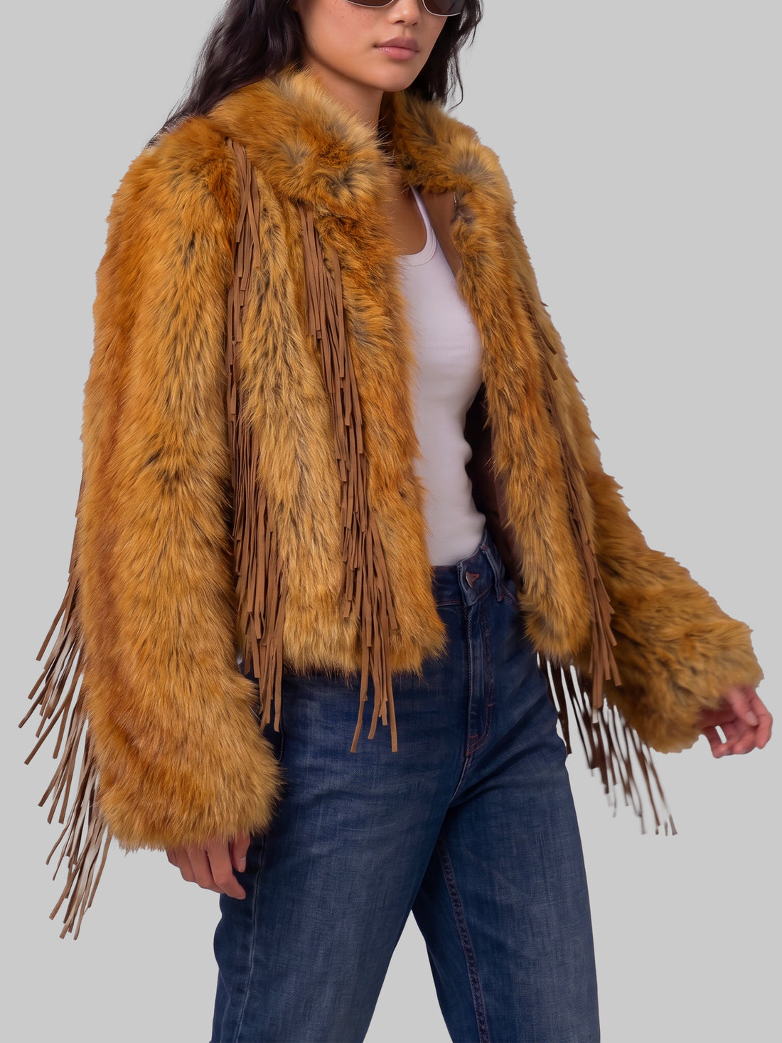 UNCOMMON 40 faux fur jacket with fringe