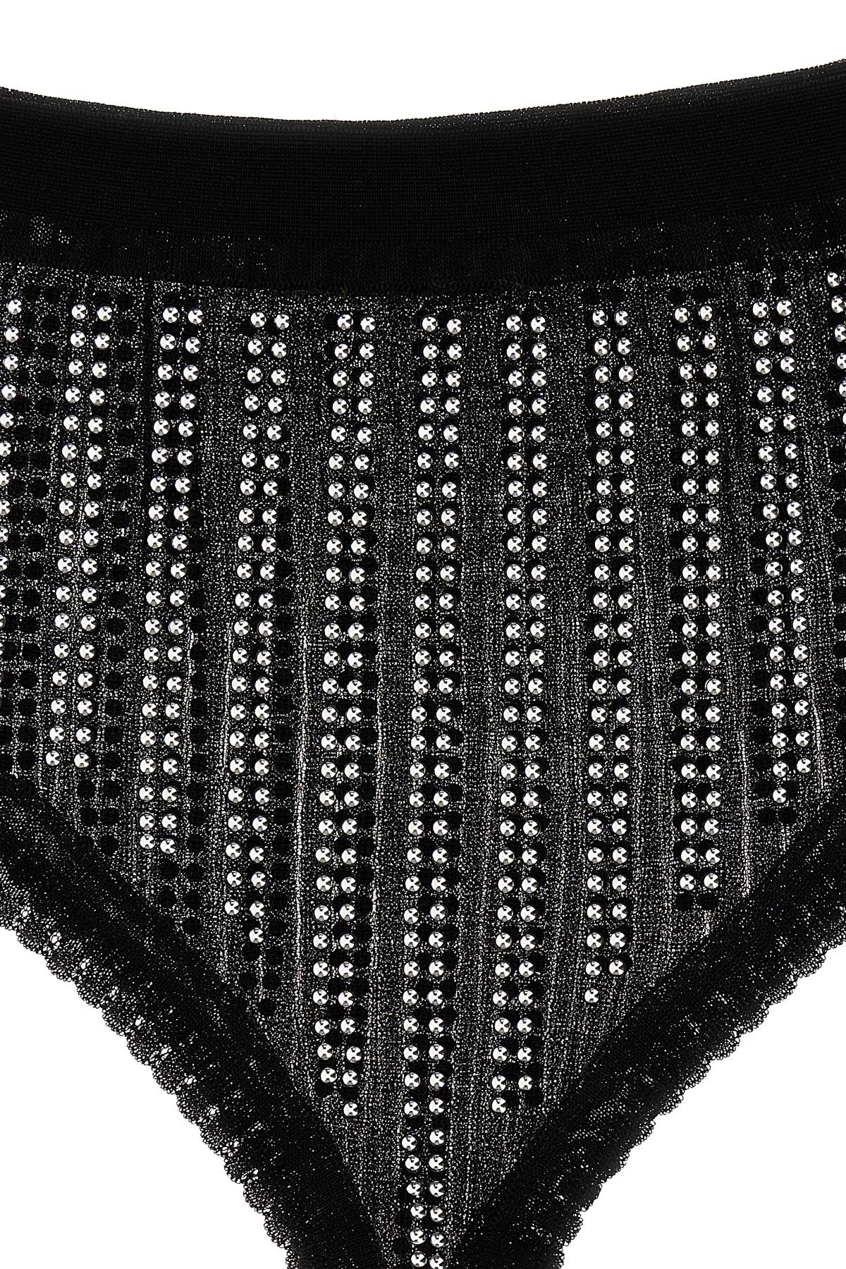 briefs in a transparent fabric withll-over studs