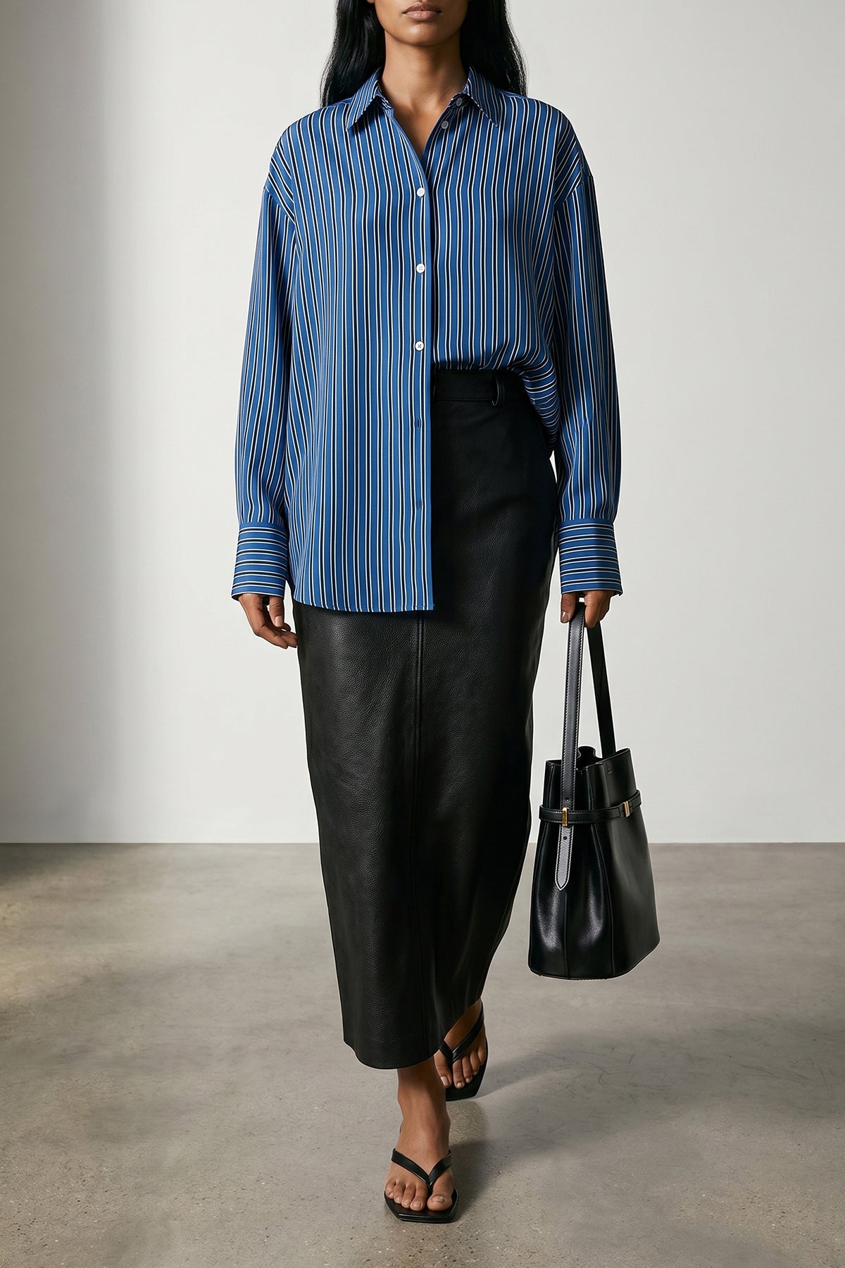 belted bucket leather shoulder bag
