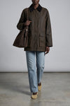belted bucket suede shoulder bag