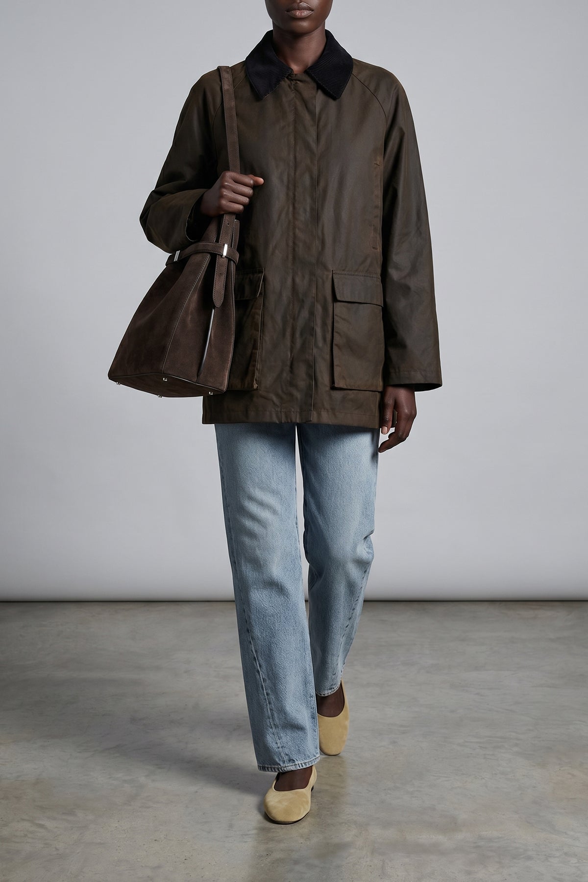 belted bucket suede shoulder bag