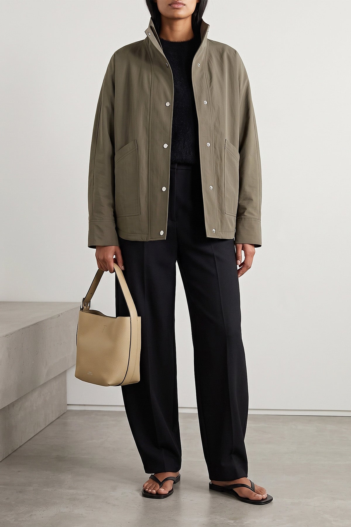 the toteme summer parachute jacket stands out for its oversized silhouette and