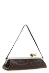 the jacquemus la pochette salon clutch defines a new geometry of luxury throug