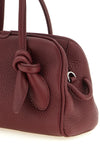 the jacquemus le petit turismo handbag reinterprets the classic bowling silhou