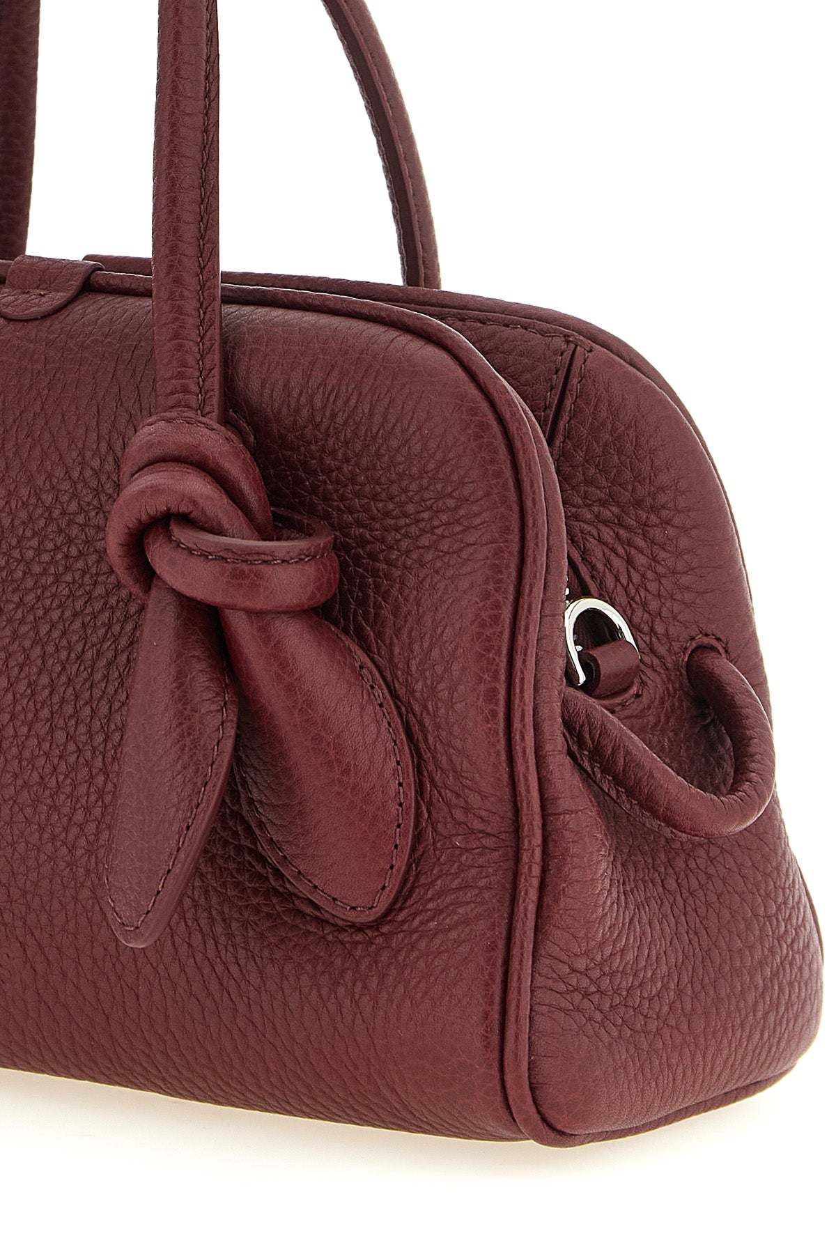 the jacquemus le petit turismo handbag reinterprets the classic bowling silhou