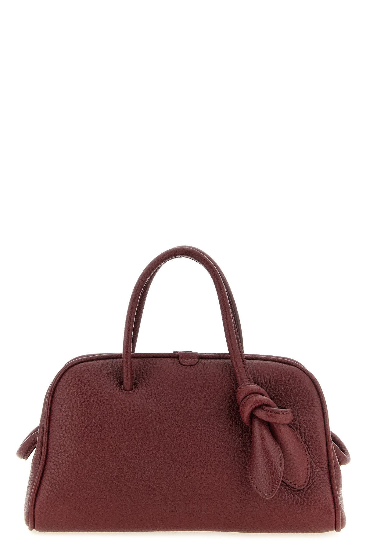 the jacquemus le petit turismo handbag reinterprets the classic bowling silhou