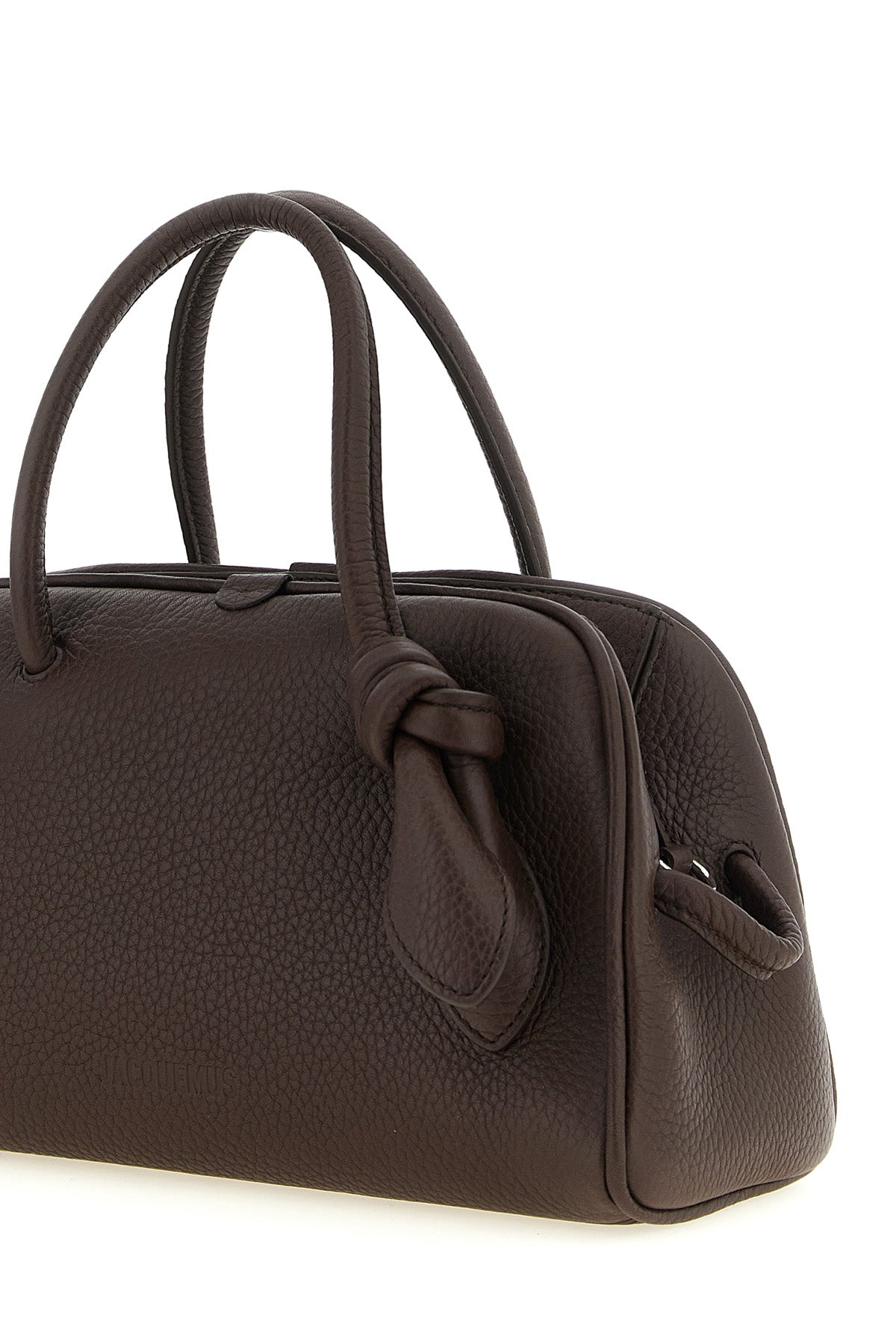 the jacquemus le petit turismo handbag reinterprets the classic bowling silhou