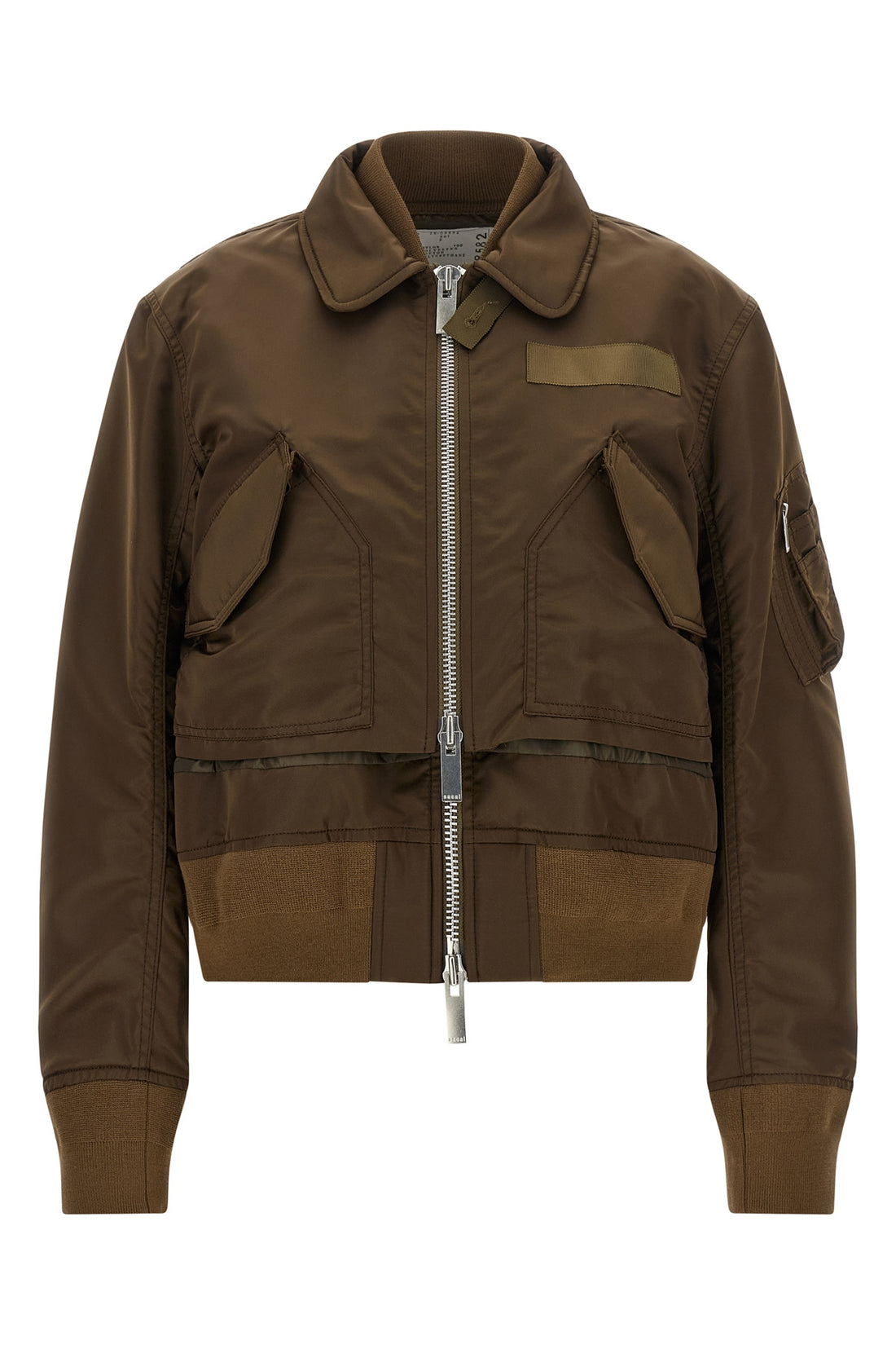 SACAI 1 the sacai double layer blouson redefines the codes of outerwear through a decons