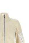 the sacai wool knit blouson exemplifies the brands distinctive hybrid construct