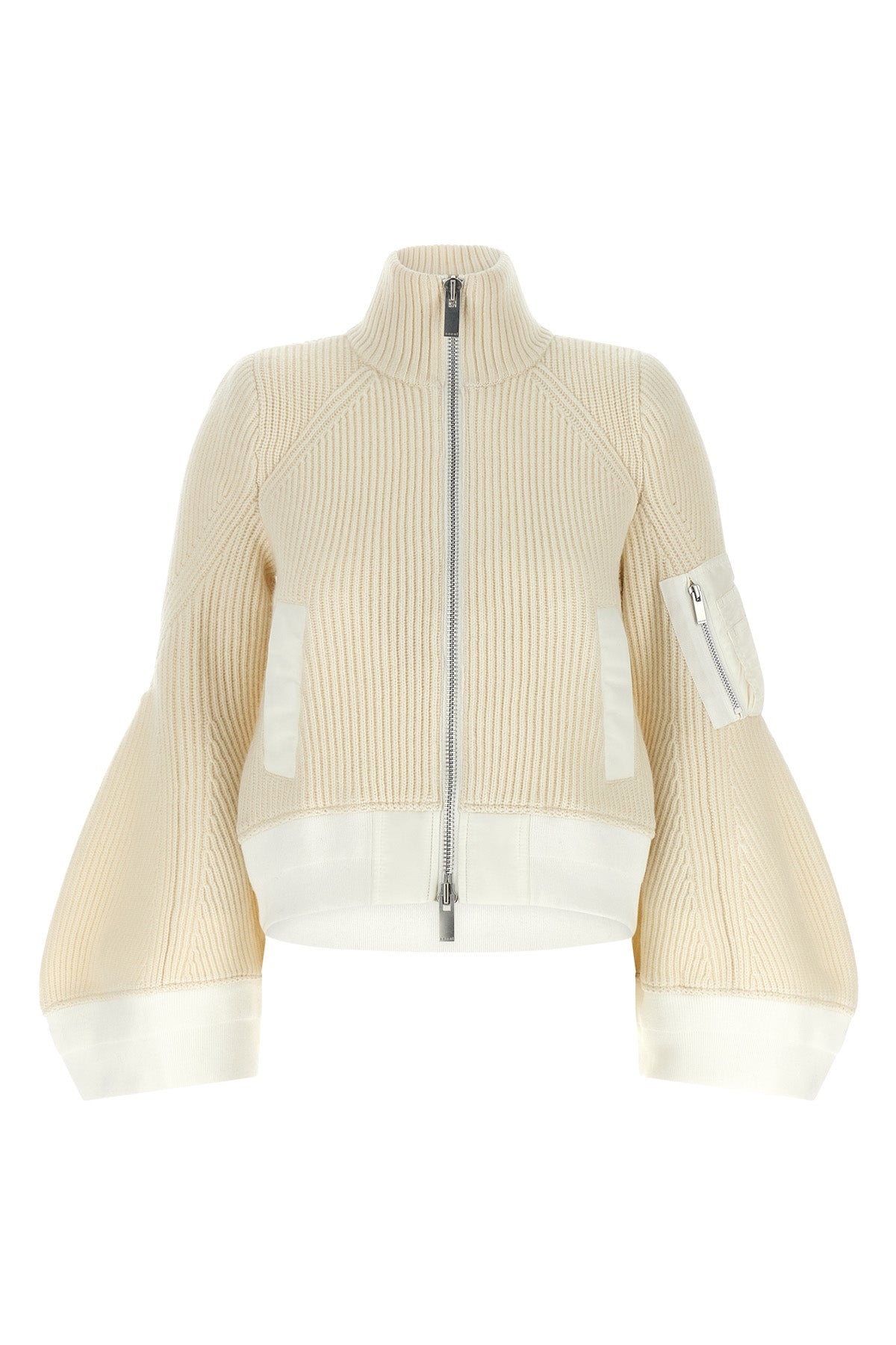 the sacai wool knit blouson exemplifies the brands distinctive hybrid construct
