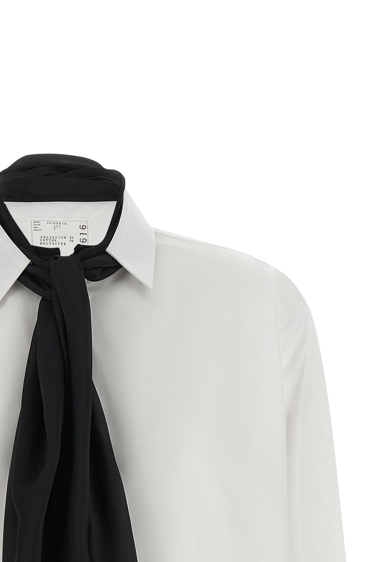 the sacai shirt redefines the codes of classic tailoring through a hybrid and de