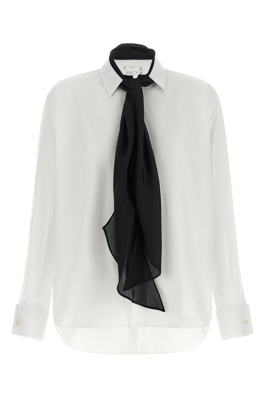 SACAI 1 the sacai shirt redefines the codes of classic tailoring through a hybrid and de