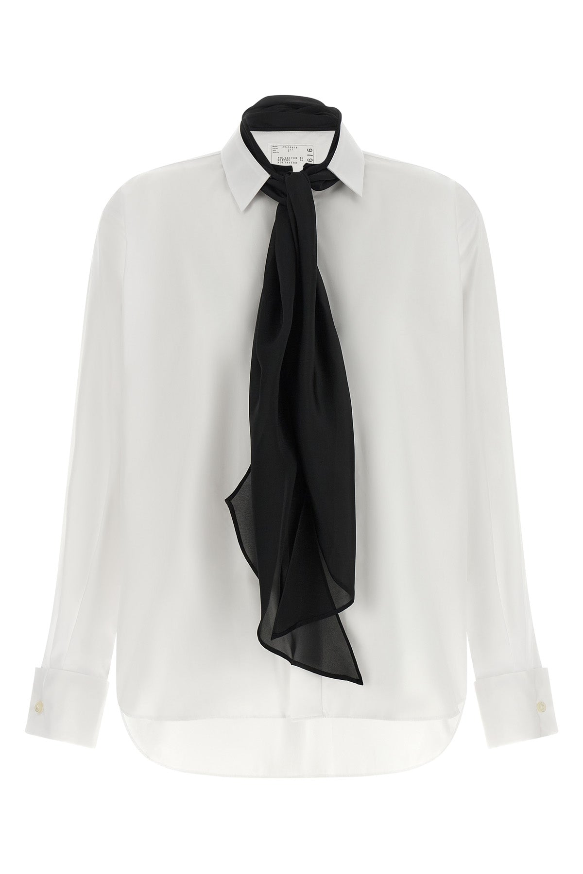 the sacai shirt redefines the codes of classic tailoring through a hybrid and de