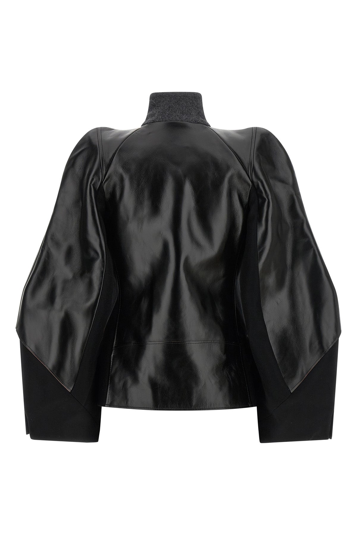 the sacai jacket redefines outerwear through a complex hybrid construction