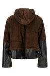 the sacai leather jacket redefines utilitarian outerwear through a masterful con