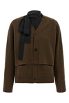 the sacai cardigan redefines knitwear codes through the brands unmistakable dec
