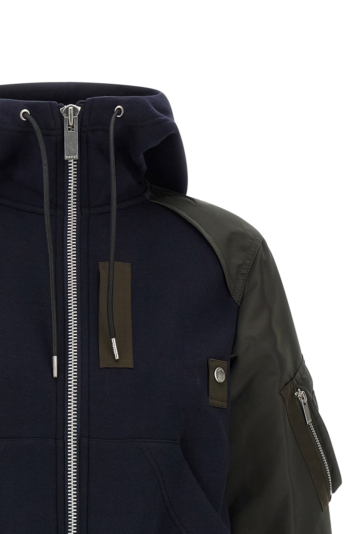 the sacai sponge hybrid sweatshirt redefines the codes of streetwear through a