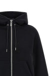 the sacai hoodie redefines the volumes of everyday wardrobe through a relaxed si