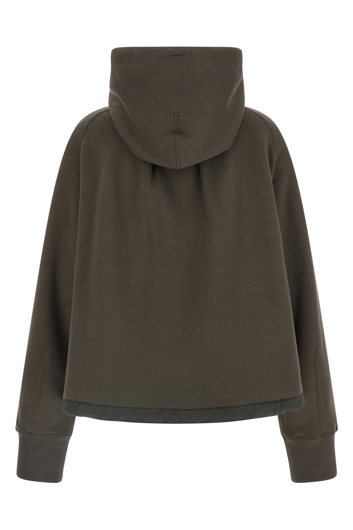 the sacai hoodie redefines casual dress codes through unexpected volumes