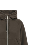 the sacai hoodie redefines casual dress codes through unexpected volumes